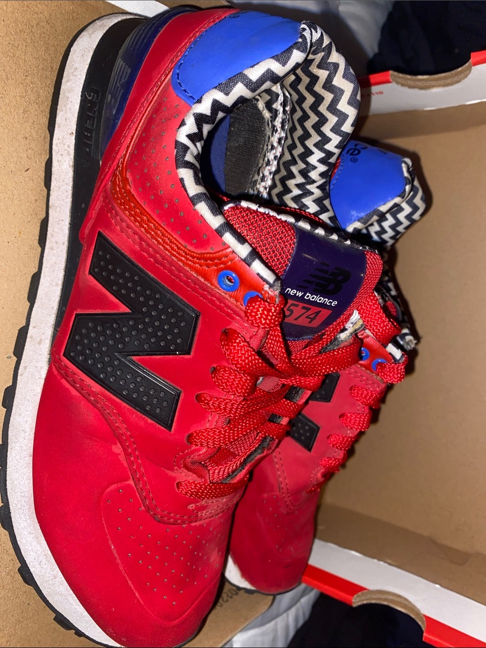 New Balance women’s Red Sneakers with Black Logo